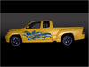 blue japanese dragon vinyl decal on yellow pickup truck